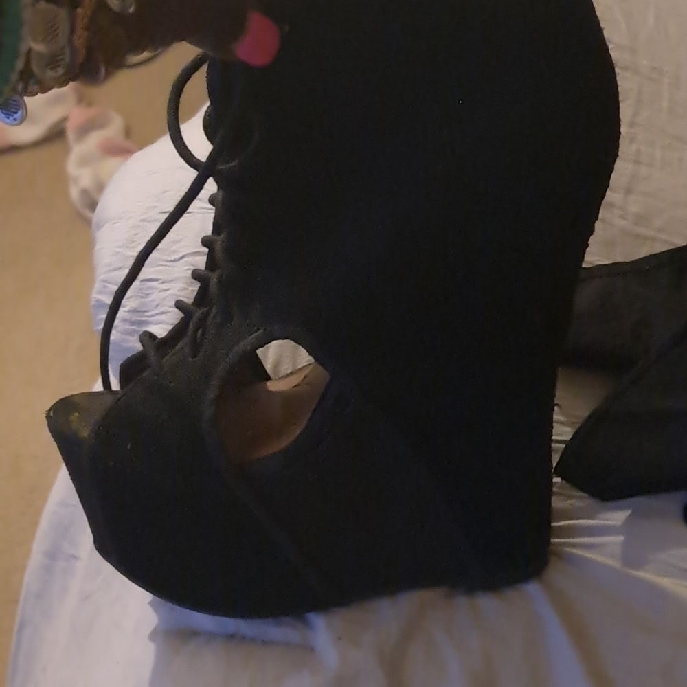 Shoe,slightly  worn Lil rub on side of one